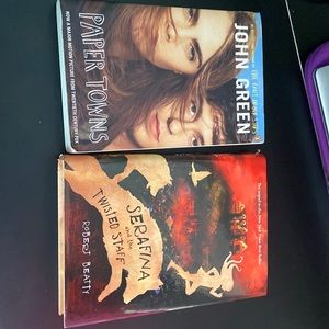 Paper Towns by John Green and Serafina and the Twisted Staff by Robert Beatty